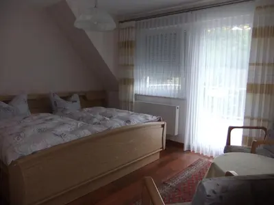 Ein Bett oder Betten in einem Zimmer der Unterkunft Ferienwohnung Morgen