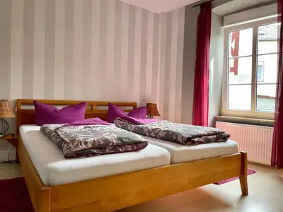 Ein Bett oder Betten in einem Zimmer der Unterkunft Springiersbacher Hof