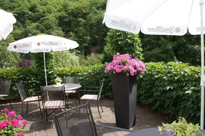 Ein Garten an der Unterkunft Bertricher Hof Hotel Garni