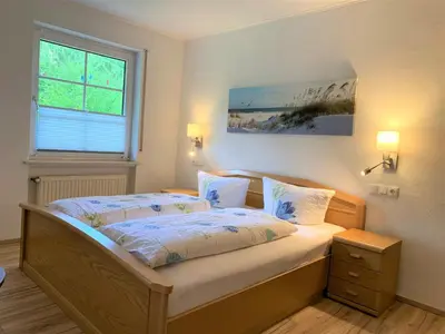 Ein Bett oder Betten in einem Zimmer der Unterkunft Beilsteiner Gästehaus