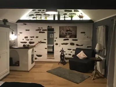 Ein Sitzbereich in der Unterkunft Alter Winzerhof