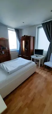 Ein Bett oder Betten in einem Zimmer der Unterkunft Hotel Rhein-Residenz