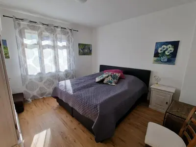 Ein Bett oder Betten in einem Zimmer der Unterkunft Georgs Ferienhaus