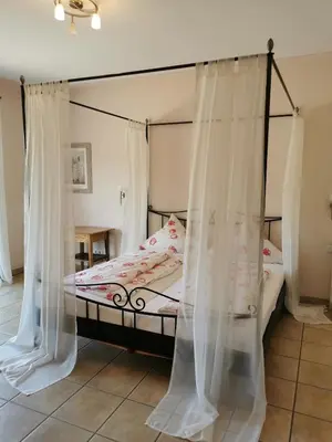 Ein Bett oder Betten in einem Zimmer der Unterkunft Weingut Amlinger&Sohn