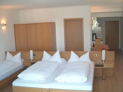 Ein Bett oder Betten in einem Zimmer der Unterkunft Hotel Retterath am Nürburgring