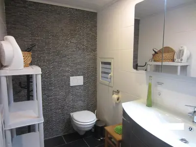 Ein Badezimmer in der Unterkunft Wohnung auf einem alten Bauernhof