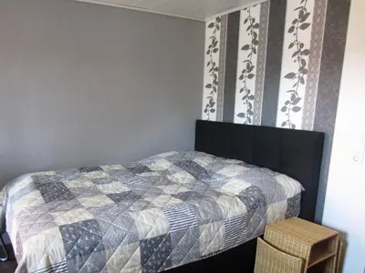 Ein Bett oder Betten in einem Zimmer der Unterkunft Wohnung auf einem alten Bauernhof