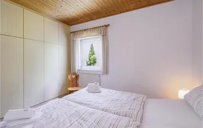 Ein Bett oder Betten in einem Zimmer der Unterkunft Ferienhaus 4 In Thalfang