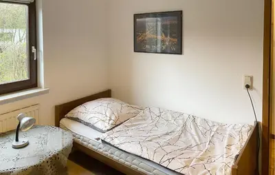 Ein Bett oder Betten in einem Zimmer der Unterkunft Ferienhaus 5 In Thalfang