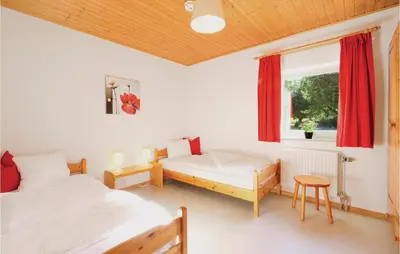 Ein Bett oder Betten in einem Zimmer der Unterkunft Ferienhaus 6 In Thalfang