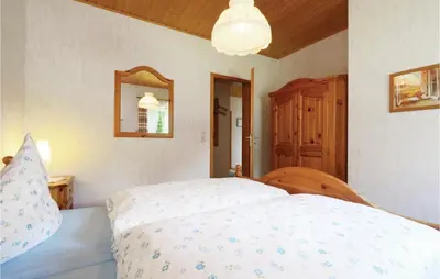 Ein Bett oder Betten in einem Zimmer der Unterkunft Ferienhaus 13 In Thalfang