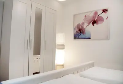 Ein Bett oder Betten in einem Zimmer der Unterkunft Ferienwohnungen Lithos