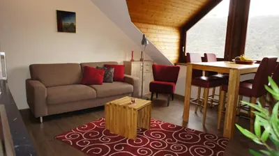 Ein Sitzbereich in der Unterkunft Ferienhaus Dreilinge