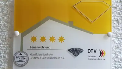 Ein Zertifikat, Auszeichnung, Logo oder anderes Dokument, das in der Unterkunft Ferienwohnung Brillant am Nationalpark Hunsrück-Hochwald ausgestellt ist