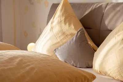 Ein Bett oder Betten in einem Zimmer der Unterkunft Landhaus Heimisch Bed & Breakfast