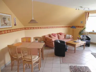 Ein Sitzbereich in der Unterkunft Ferienwohnungen Gibbert