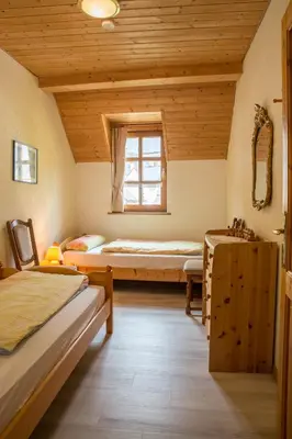 Ein Bett oder Betten in einem Zimmer der Unterkunft Ferienhaus Marie