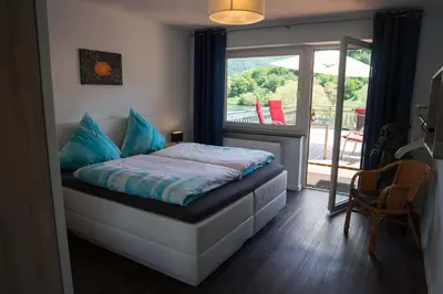 Ein Bett oder Betten in einem Zimmer der Unterkunft Ferienwohnung Sonnendeck