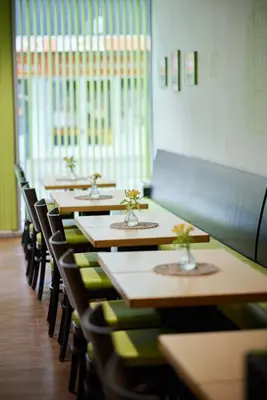 Ein Restaurant oder anderes Speiselokal in der Unterkunft ante porta DAS STADTHOTEL