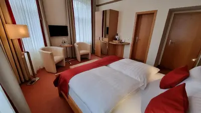 Ein Bett oder Betten in einem Zimmer der Unterkunft Gasthaus Pension Moselgruss