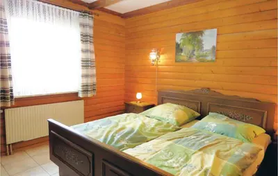 Ein Bett oder Betten in einem Zimmer der Unterkunft Ferienhaus 8 In Thalfang