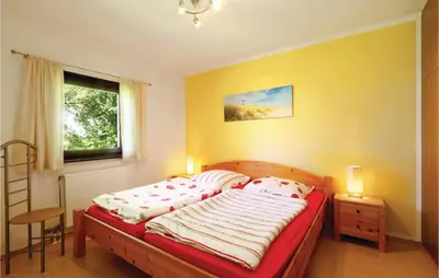 Ein Bett oder Betten in einem Zimmer der Unterkunft Ferienhaus 9 In Thalfang