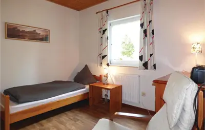Ein Bett oder Betten in einem Zimmer der Unterkunft Ferienhaus 17 In Thalfang