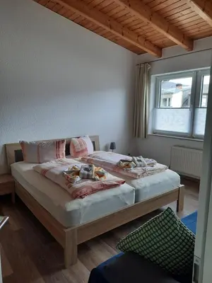 Ein Bett oder Betten in einem Zimmer der Unterkunft Niedersburger Eck, wandern, radfahren, genießen, erholen