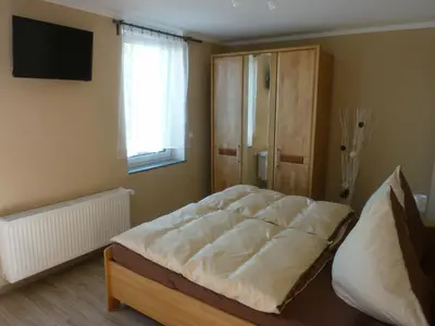 Ein Bett oder Betten in einem Zimmer der Unterkunft Welterbe Mittelrhein