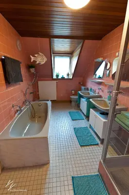 Ein Badezimmer in der Unterkunft Quilt Inn