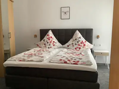 Ein Bett oder Betten in einem Zimmer der Unterkunft Haus Ostermann