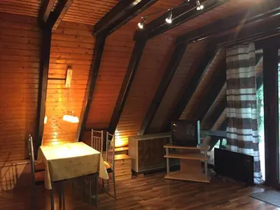 Ein Sitzbereich in der Unterkunft Familienfreundliches Ferienhaus mit Waldrand Lage