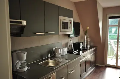 Küche/Küchenzeile in der Unterkunft Gästezimmer im Weingut Amlinger&Sohn