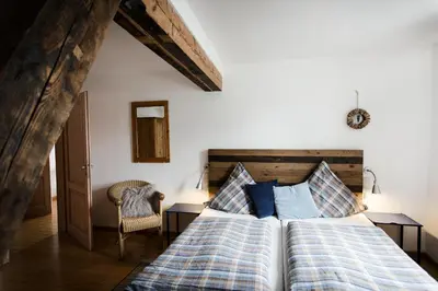 Ein Bett oder Betten in einem Zimmer der Unterkunft Ferienwohnung Weis