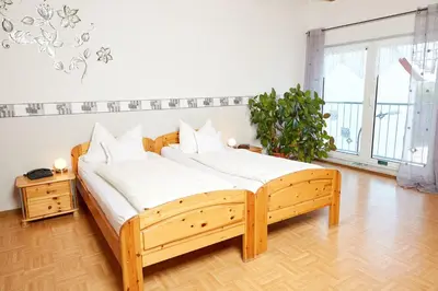 Ein Bett oder Betten in einem Zimmer der Unterkunft Hotel-Restaurant Maas