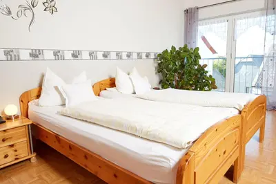 Ein Bett oder Betten in einem Zimmer der Unterkunft Hotel-Restaurant Maas
