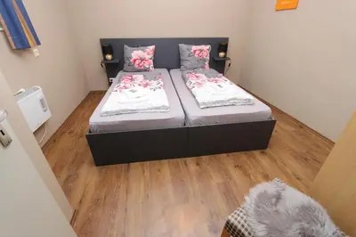 Ein Bett oder Betten in einem Zimmer der Unterkunft Ferienhaus Moselgasse