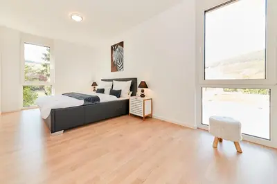 Ein Bett oder Betten in einem Zimmer der Unterkunft Traumblick Burg