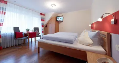 Ein Bett oder Betten in einem Zimmer der Unterkunft Ferienhaus Zenz - Gästezimmer im Winzerhaus