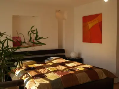 Ein Bett oder Betten in einem Zimmer der Unterkunft Ferienwohnung Berweiler