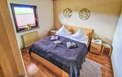 Ein Bett oder Betten in einem Zimmer der Unterkunft Ferienhaus 10 In Thalfang