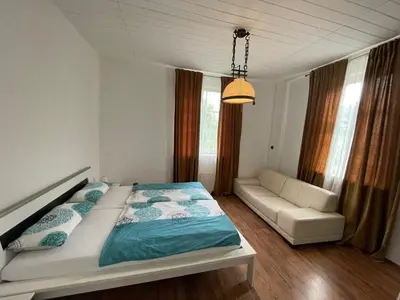 Ein Bett oder Betten in einem Zimmer der Unterkunft Paradiesisch Wohnen - Loreley
