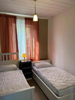 Ein Bett oder Betten in einem Zimmer der Unterkunft Paradiesisch Wohnen - Loreley