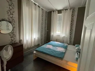 Ein Bett oder Betten in einem Zimmer der Unterkunft Paradiesisch Wohnen - Loreley