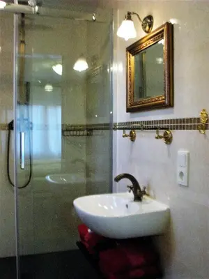 Ein Badezimmer in der Unterkunft Héritage B&B