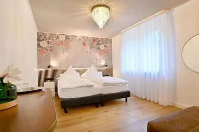 Ein Bett oder Betten in einem Zimmer der Unterkunft Hotel Zehnthof