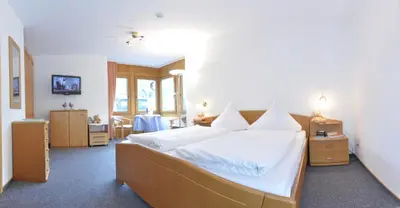 Ein Bett oder Betten in einem Zimmer der Unterkunft Weinhaus am Schieferfels