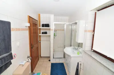 Ein Badezimmer in der Unterkunft Haus Rheinterrasse