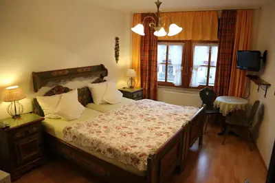 Ein Bett oder Betten in einem Zimmer der Unterkunft Winzerhäuschen am Brunnen