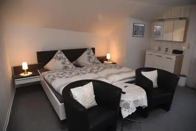 Ein Bett oder Betten in einem Zimmer der Unterkunft Pension Heib